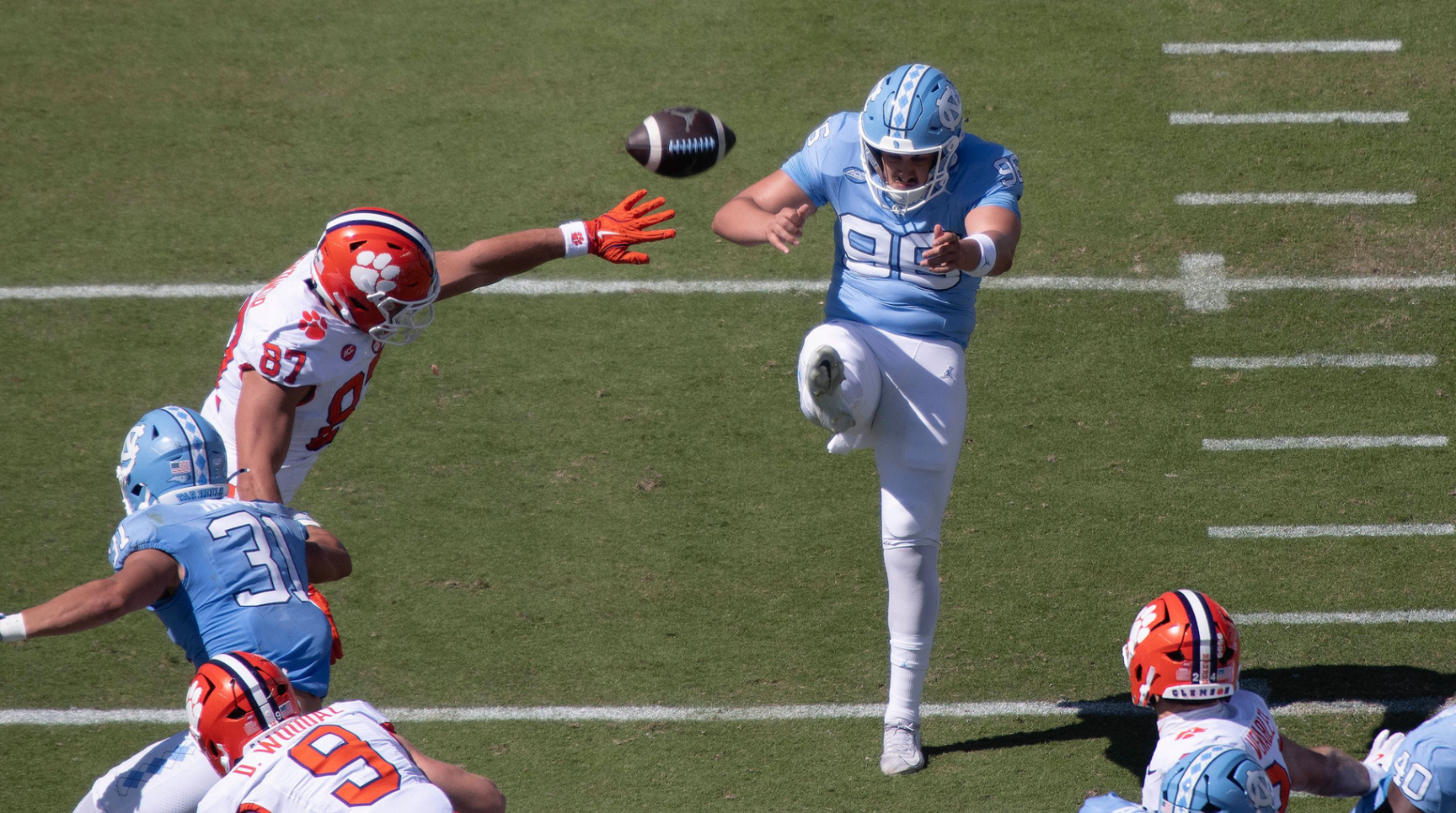 Tom Maginness punting in-game for UNC against Clemson